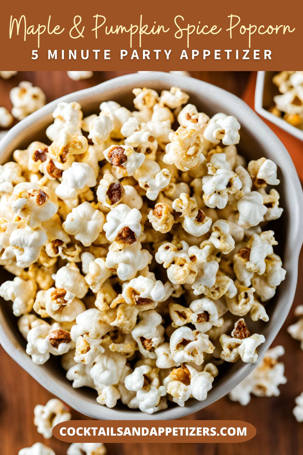 Maple pumpkin popcorn sits in a white bowl on a table.