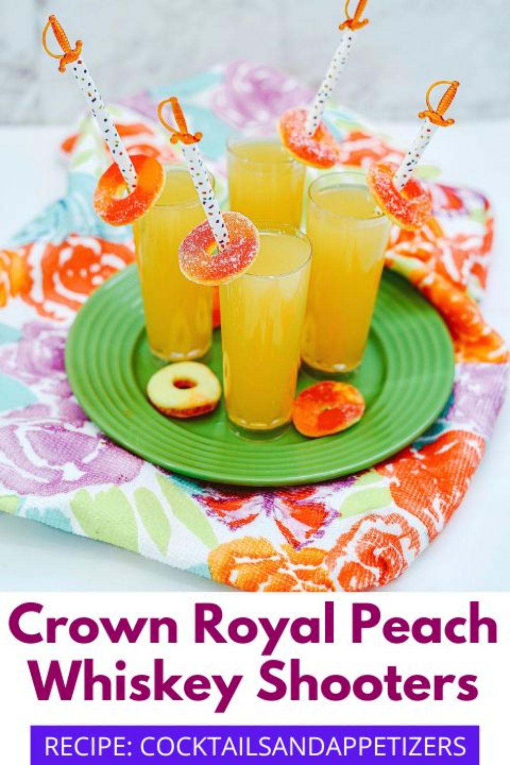 Crown Royal Peach Whisky Shooters on a green tray