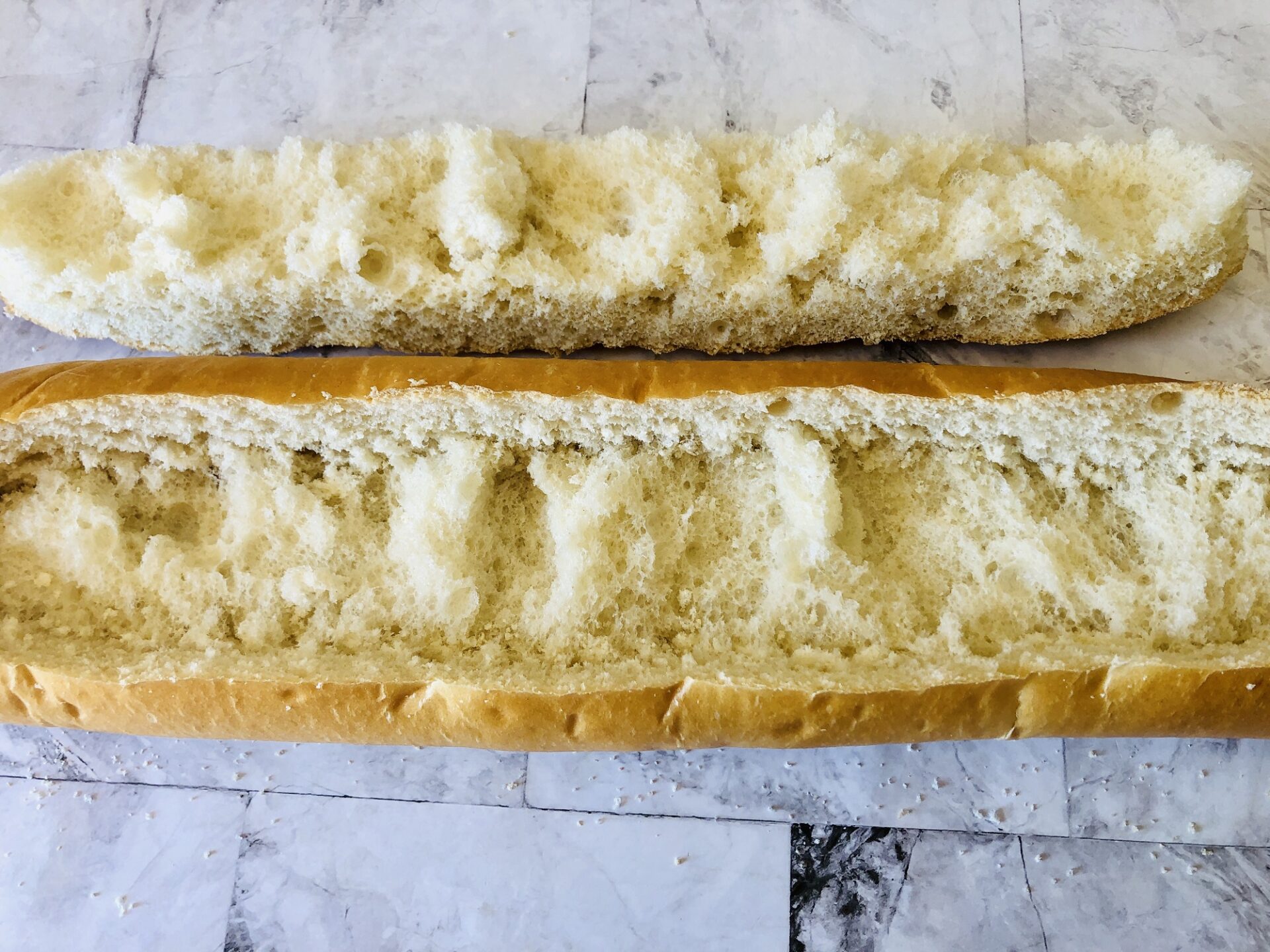 A baguette carved out to be filled.