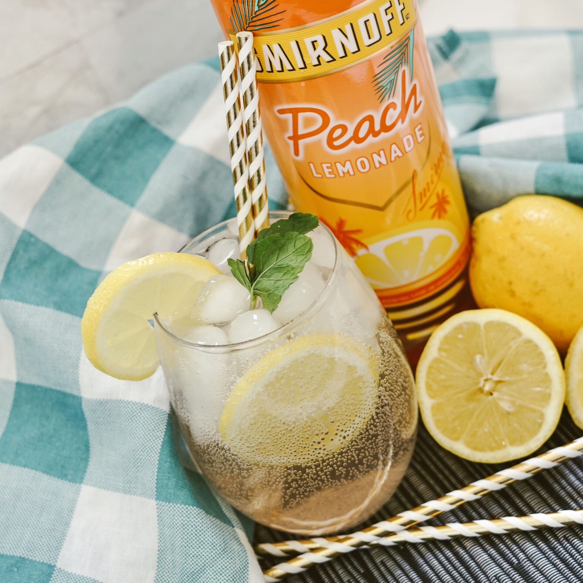 Peach lemonade vodka seltzer with ingredients.