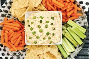 Buffalo Ranch Dip with carrots, celery and chips