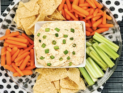Buffalo Ranch Dip with carrots, celery and chips