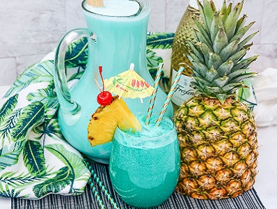 Blue Hawaiian cocktail in a pitcher