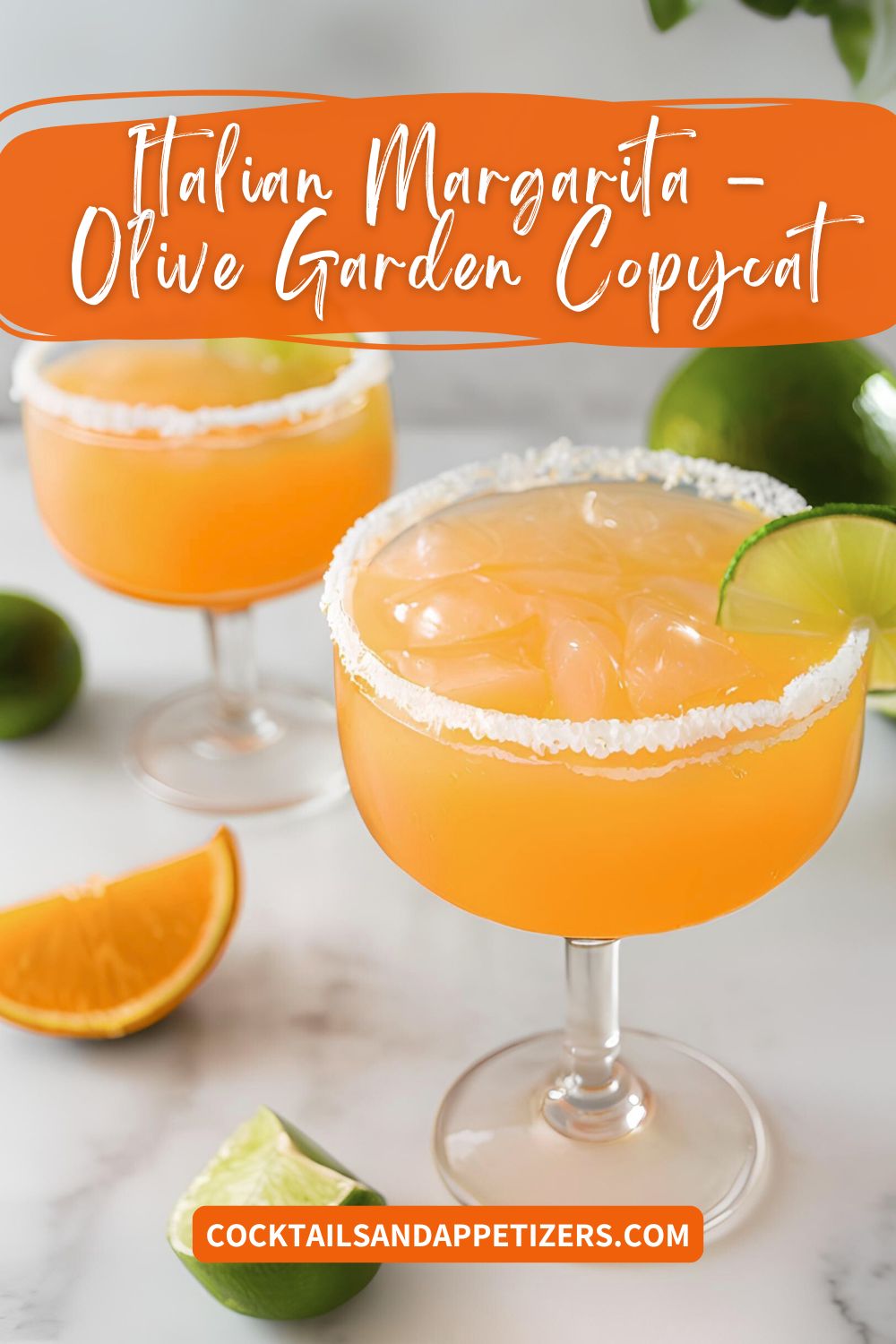 Italian margaritas in glasses with salted rim and lime wedge garnish.