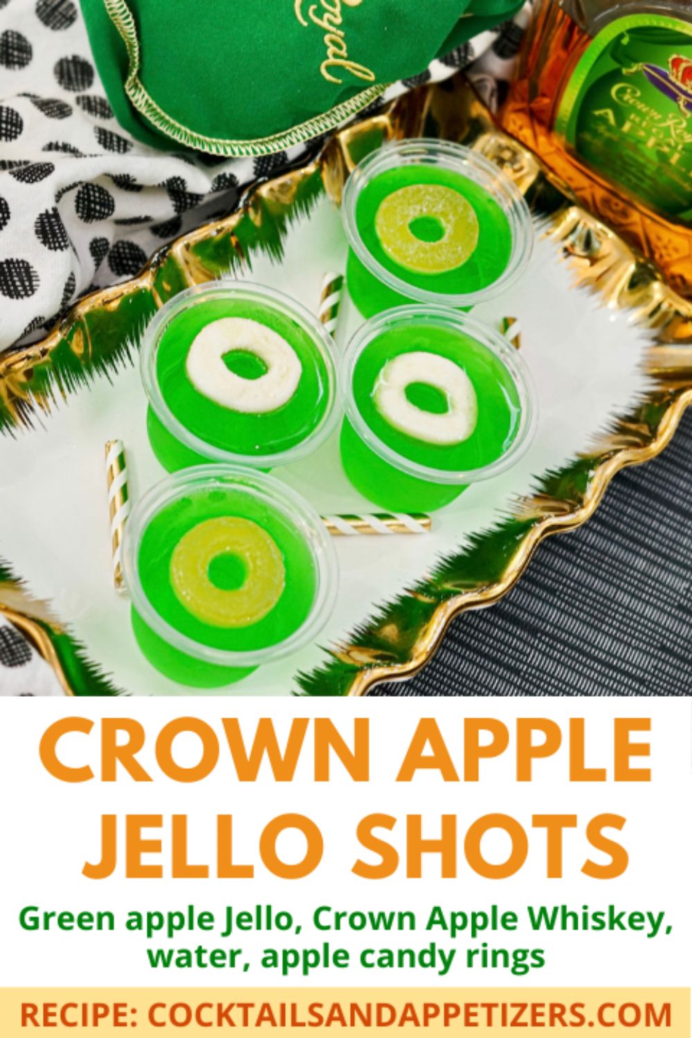 Crown Apple Jello shots with apple ring garnish on a tray
