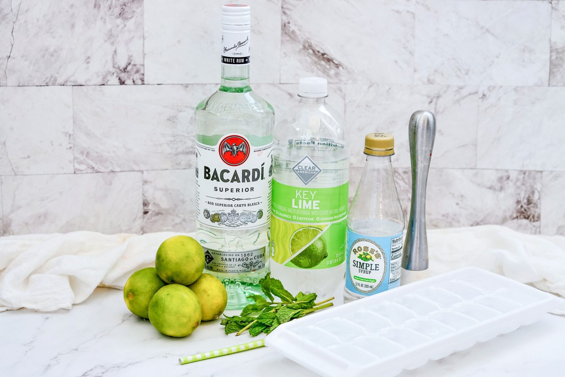 Ingredients for Cuban mojito on a counter.