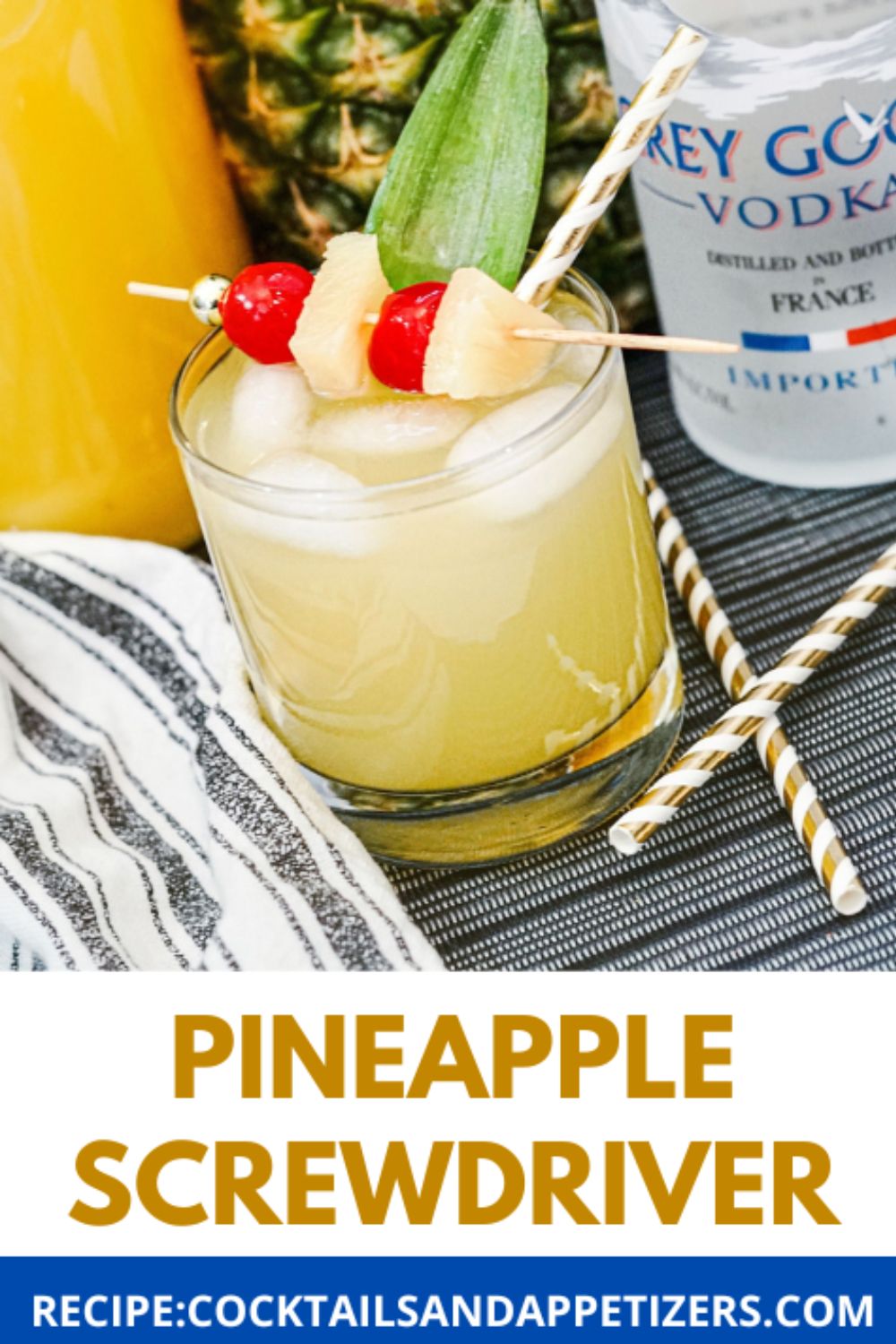 Pineapple Screwdriver cocktail with a cherry garnish.