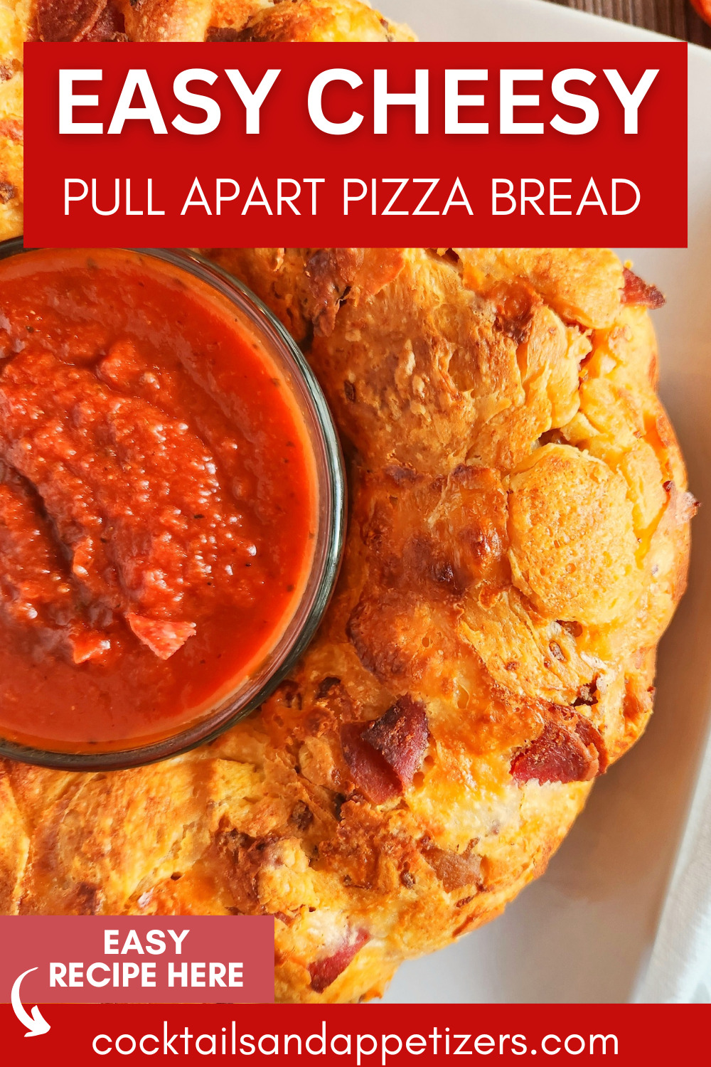 Pull Apart Pizza Bread with dipping sauce on a plate