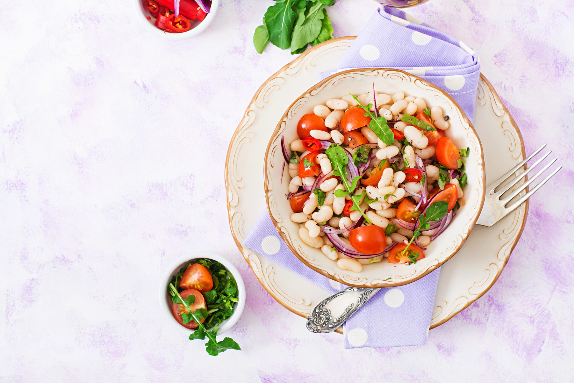 Cannellini bean salad with red onion.