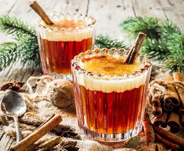 Hot Buttered Rum with cinnamon stick