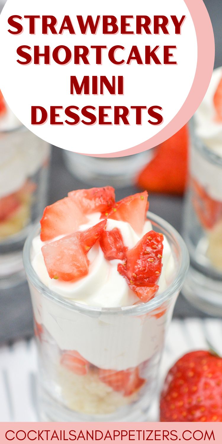 Strawberry Shortcake mini desserts in shot glasses with whipped cream and strawberry garnish.