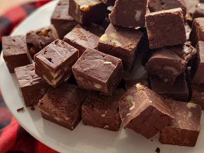 Chocolate Fudge pieces on a white plate
