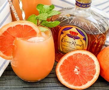 Crown Royal Whiskey Smash cocktail in glass with grapefruit slice garnish