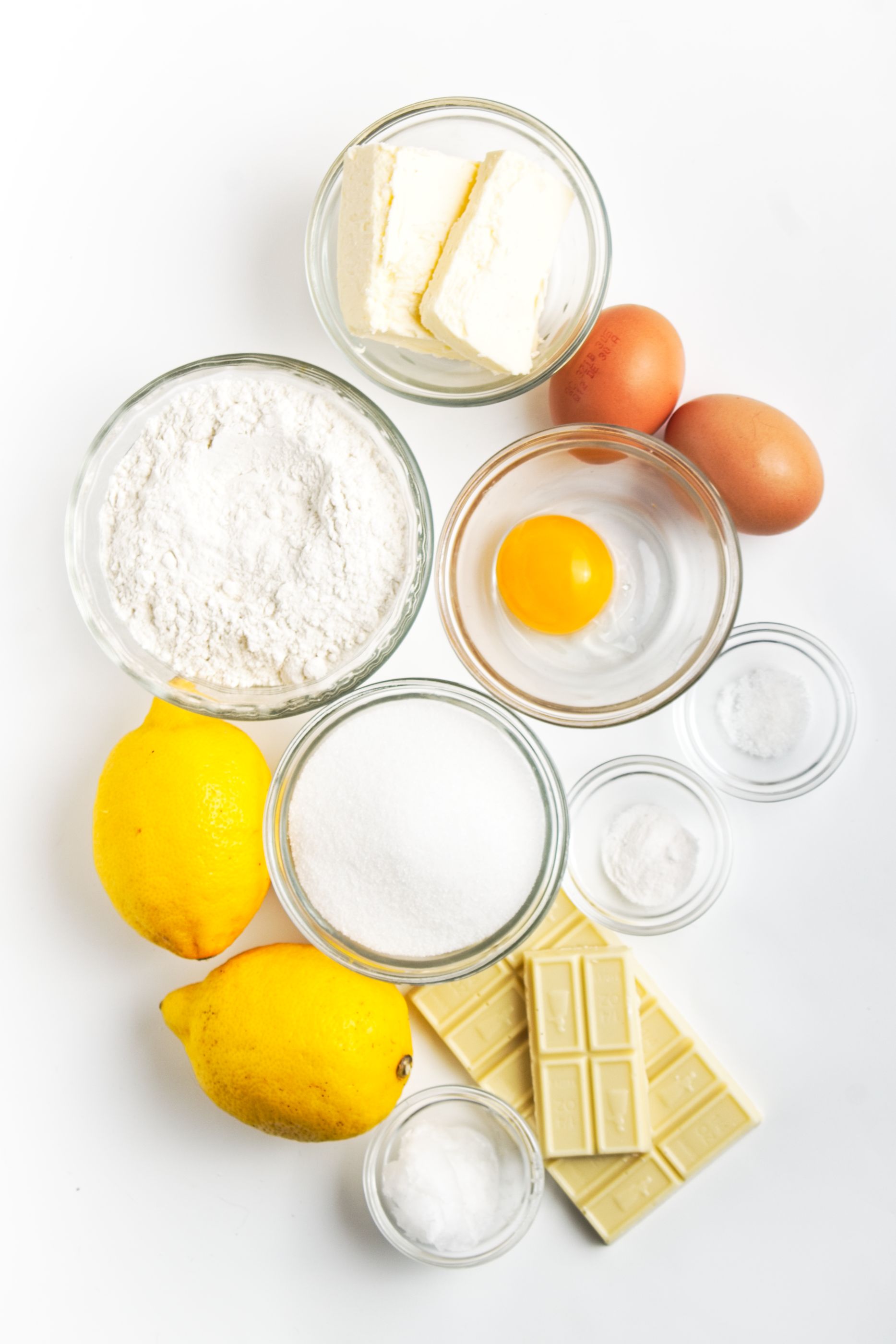 Ingredients for lemon madeleines on a counter.