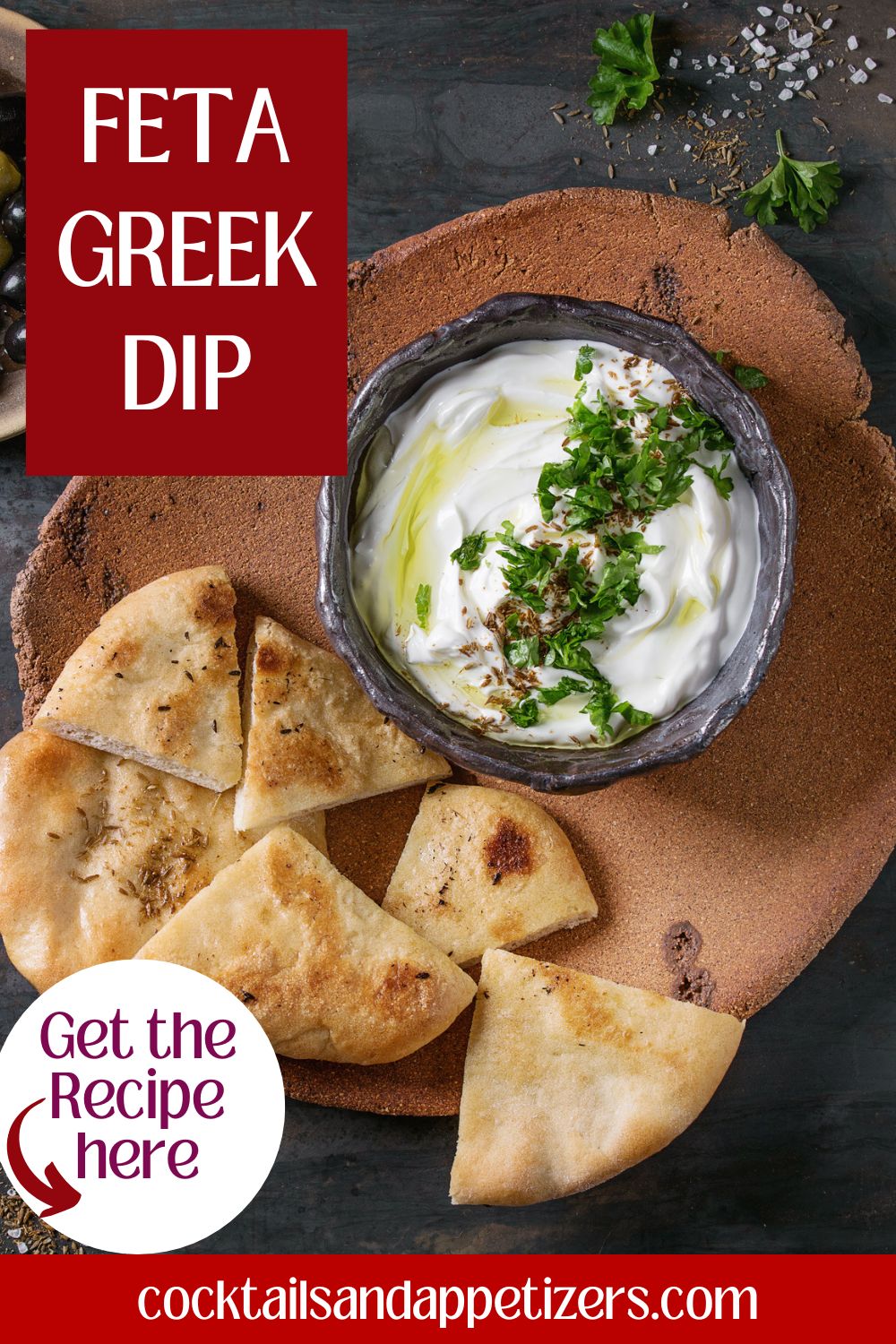 Feta Greek Yogurt Dip in a bowl with oil and fresh herbs.