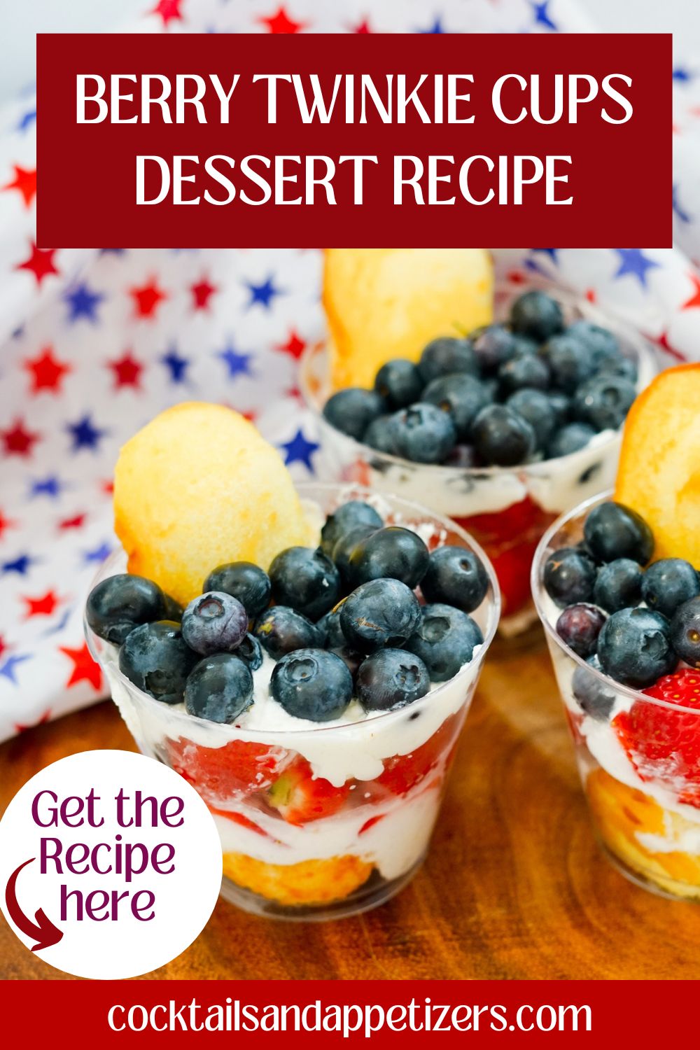 Fruity Twinkie Cake dessert cups with strawberries and blueberries with whipped cream.