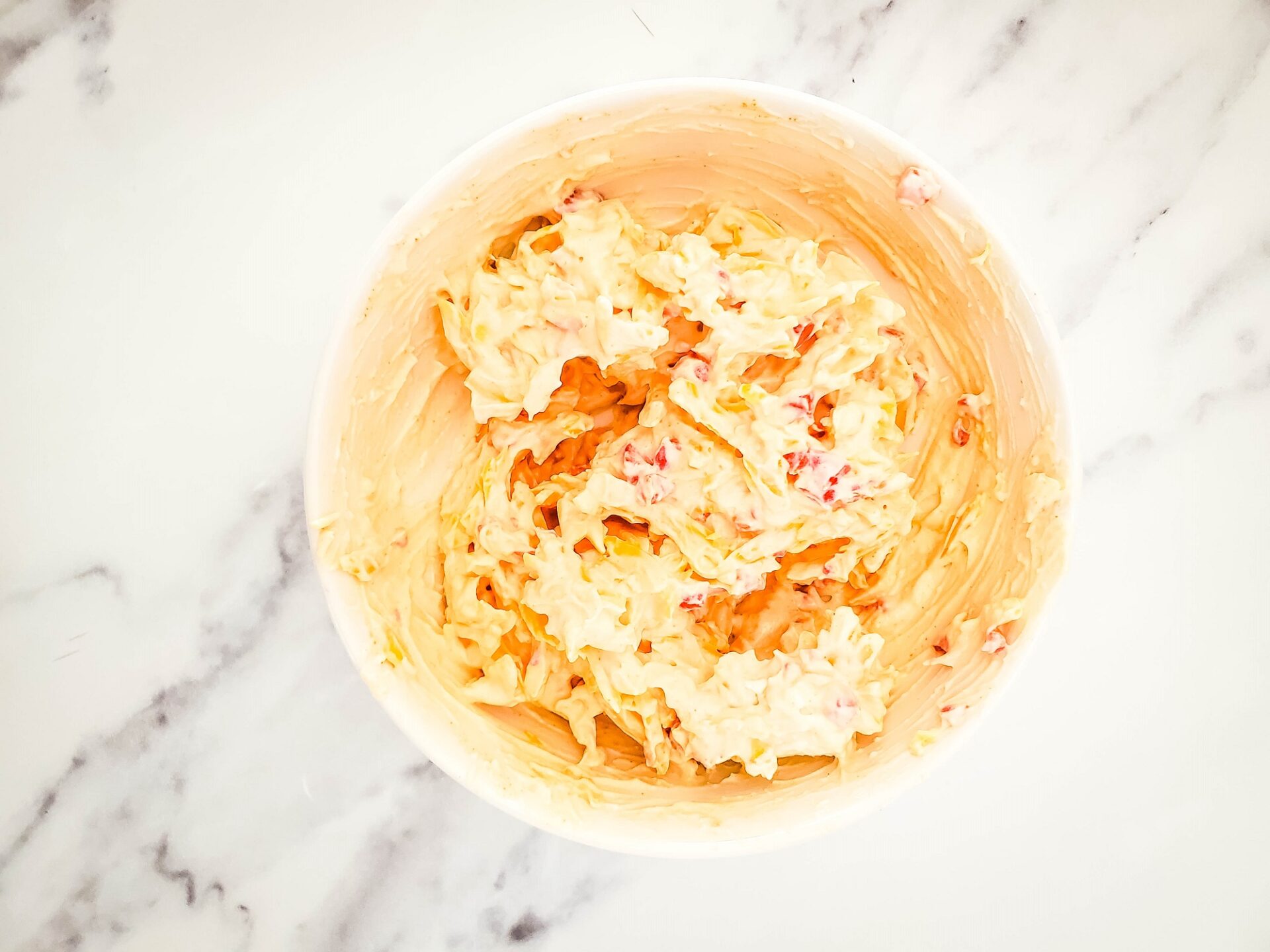 Pimento cheese mixture in a bowl.