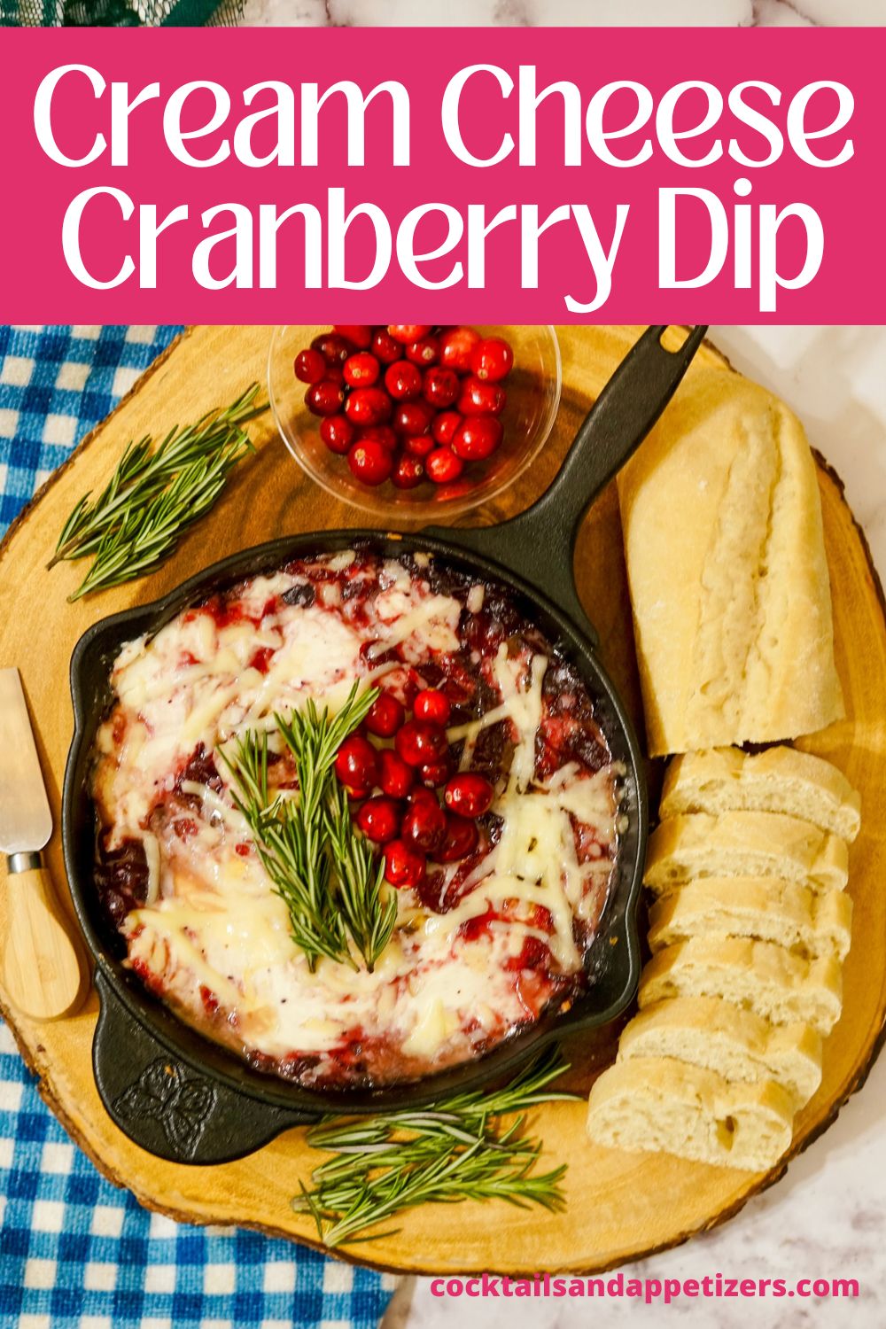 Cream Cheese Cranberry Dip in a skillet, along with bread for dipping.