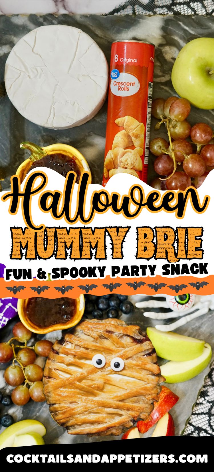 Mummy baked brie sits on a platter with fig jam alongside, and grapes.