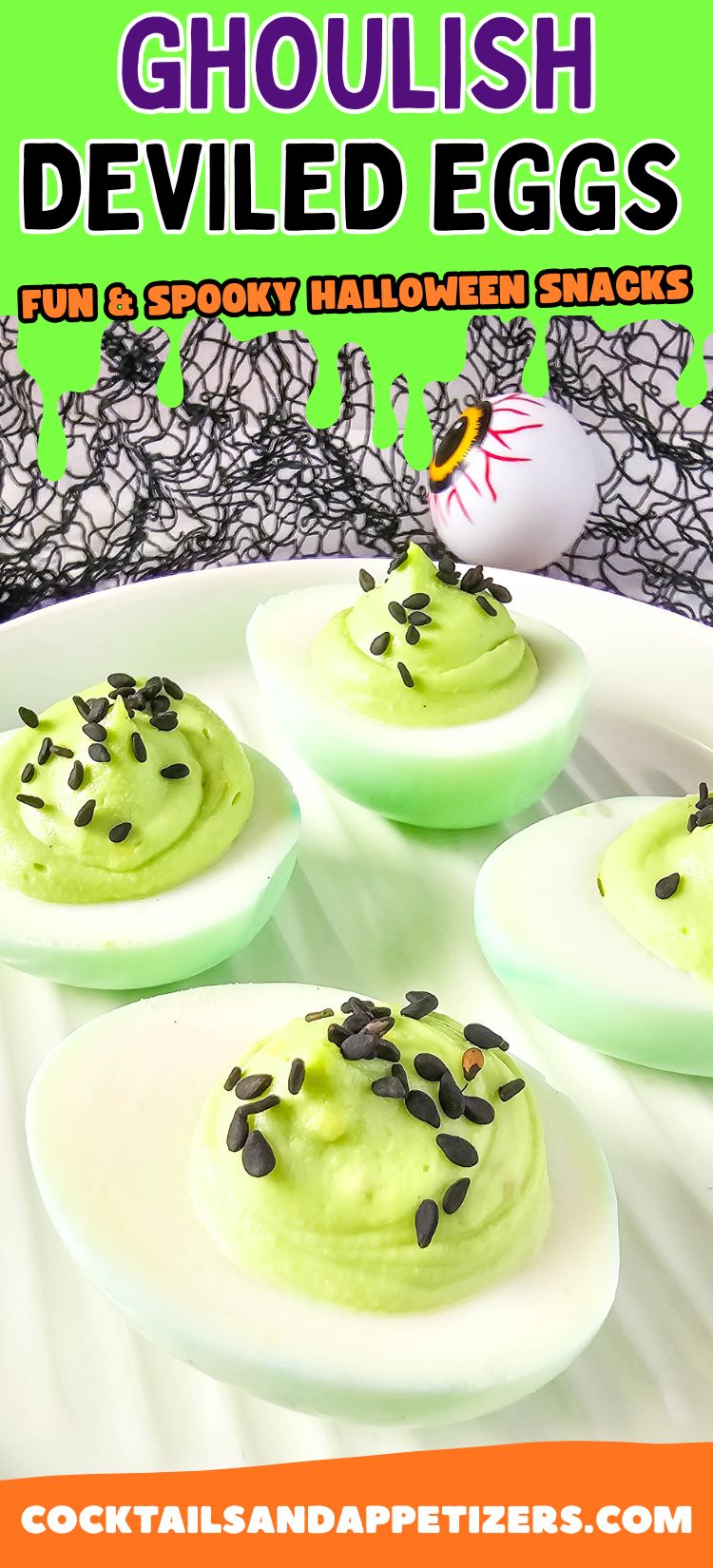 Green deviled eggs with black sesame seed garnish sit on a white plate.
