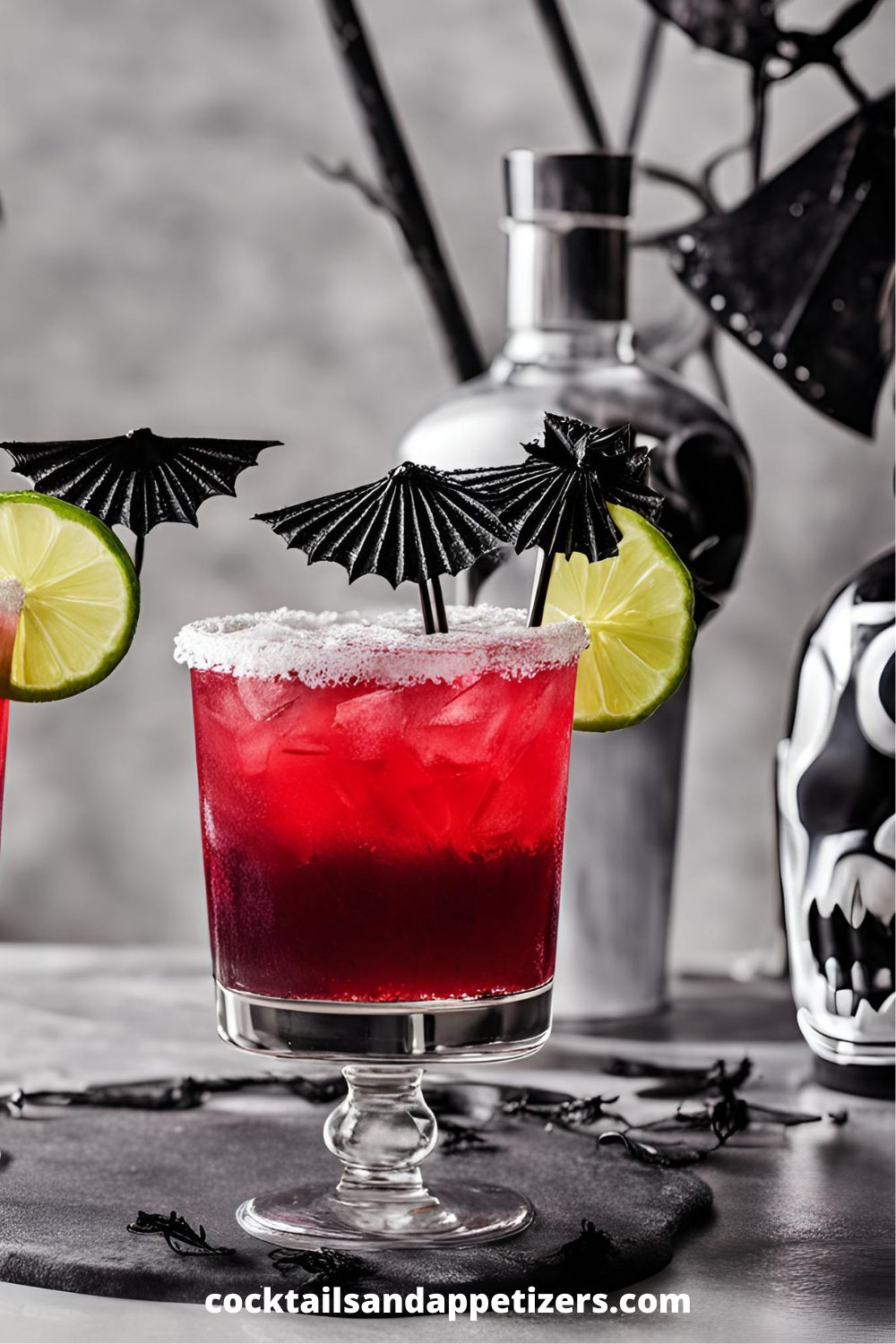 Beetlejuice Margarita in a salt rimmed glass with black cocktail umbrella and lime slice garnish.
